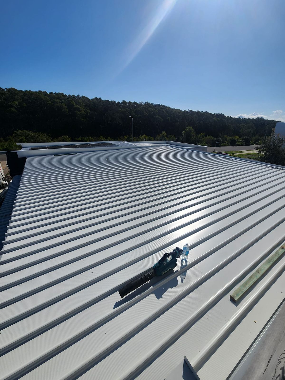 Low pitch metal roof sheeting